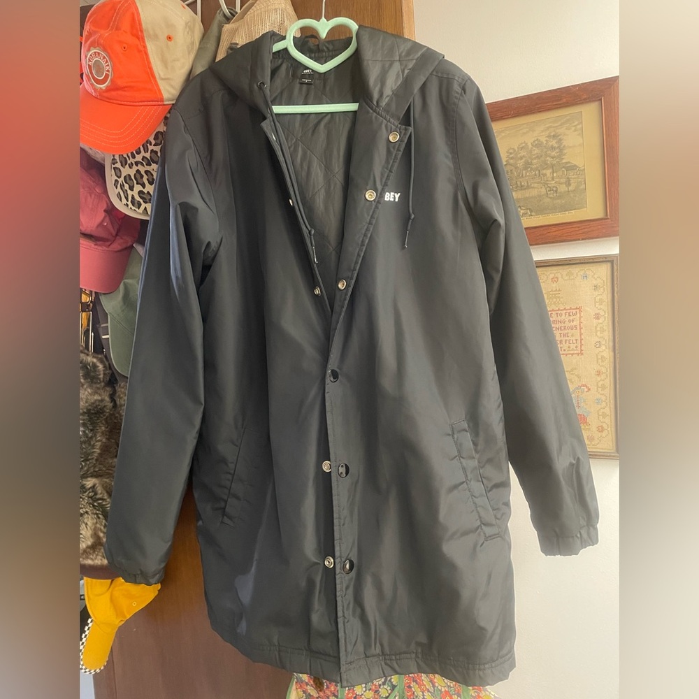 Obey brand size S long rain coat
